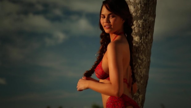 Chrissy Teigen wears nothing but paint